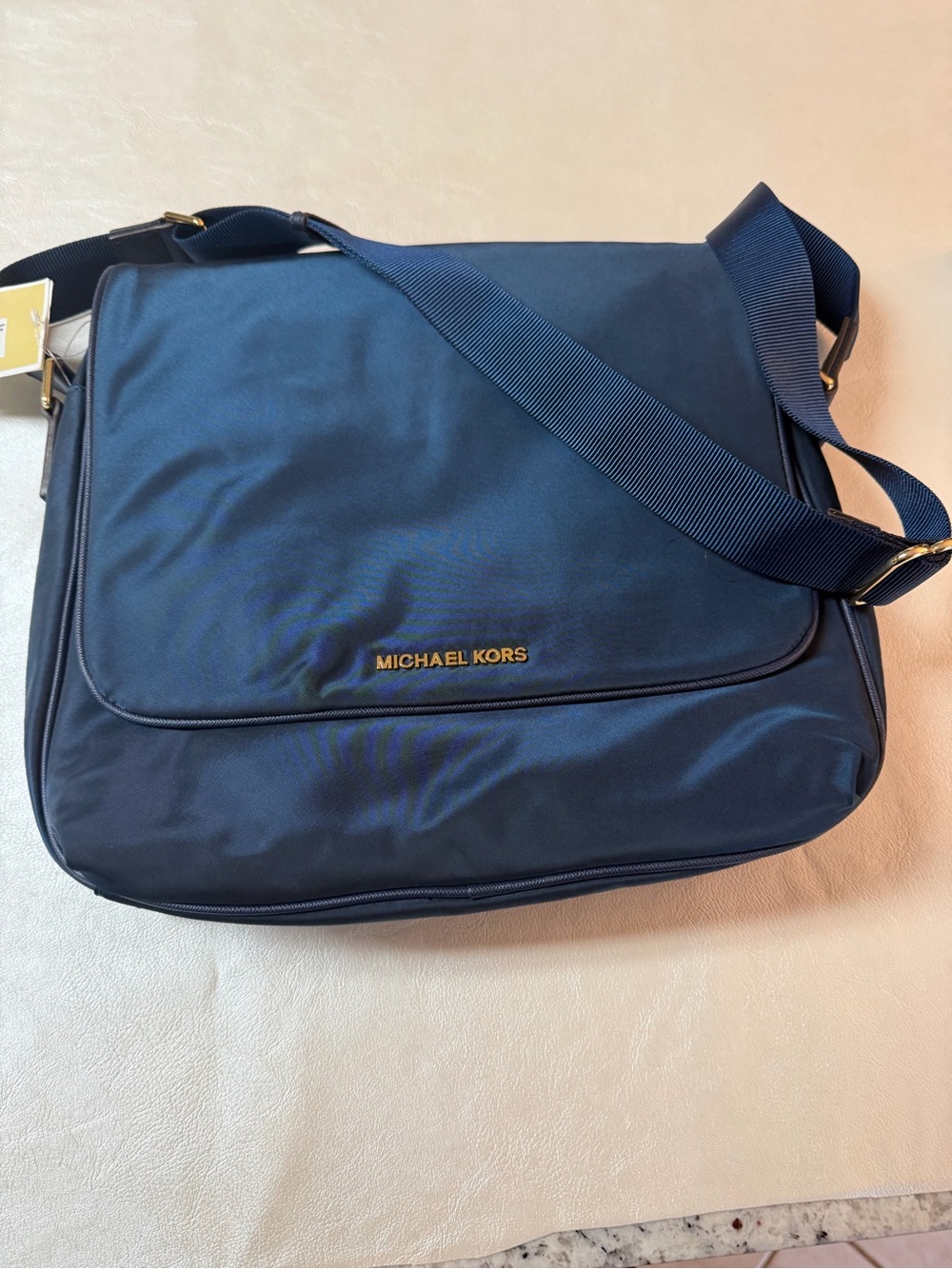 Michael Kors Navy Messenger Bag with Gold Logo
